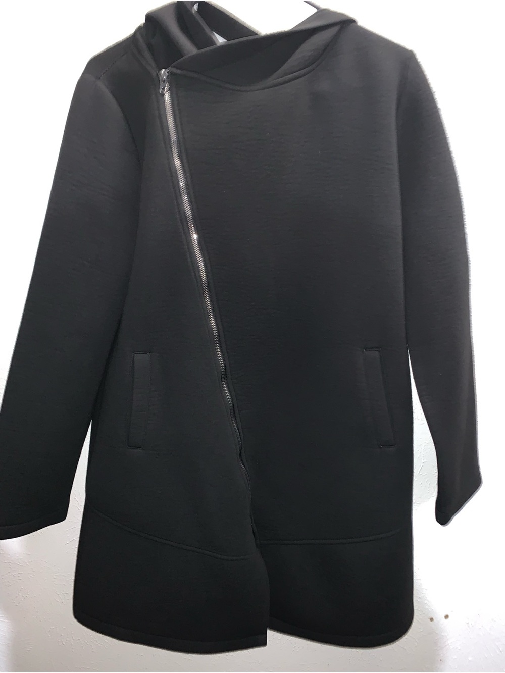 Women’s hooded asymmetrical zip coat